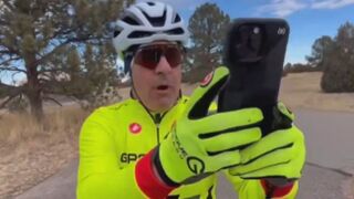 Cyclist has a meltdown and brags about how he owns a "newspaper"