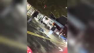 Black Man brings a Stick and Flattens White Man in the Street