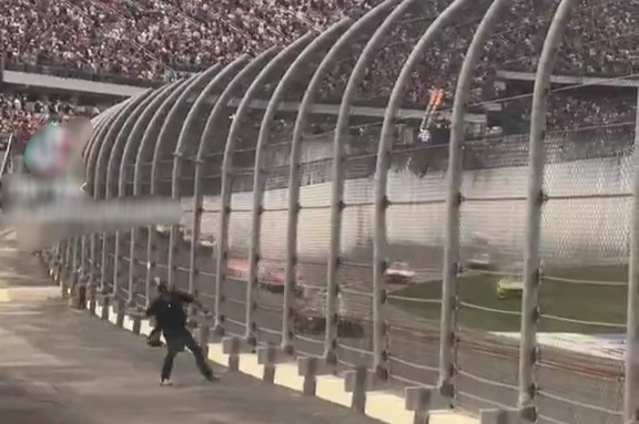 A man seemed to toss someone’s ashes at the Daytona 500 finish yesterday.