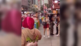 Currently in Times Square: Naked Woman being Chased by the Cops