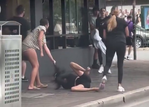 Shocking moment brawl erupts outside a McDonald's after two girls gang up on victim - as 'girl gangs' terrorize Maroubra