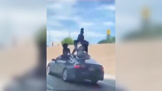 Girls Twerking on Top of Car on the Highway....Next Video I hope isn't their Demise