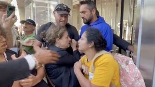 Deranged Climate Cultists Block a Woman From Entering a Bank!