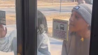 A woman is seen arguing with a CTA bus driver at a stop