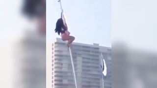 Girl in Bikini Climbs Flag Pole..it does NOT End Well