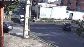 Stolen car collides with motorcycle during chase; driver was a hostage.