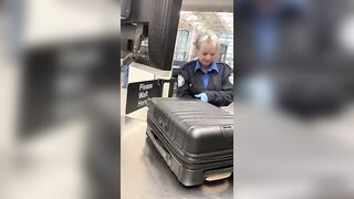 What's in this Girl's Luggage that makes this TSA Woman so happy?