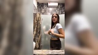 Not the girl Dancing..But look at the Door in the First Stall WTH?