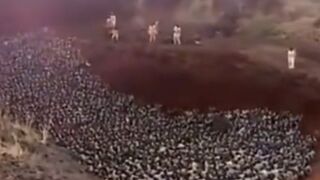 Like Sheep's to Slaughter.... 'Herd' of People Lured to a Pit and Get Gassed in Africa.