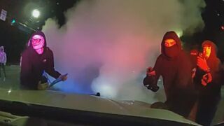 Two Police Cruisers Damaged During Street Takeover