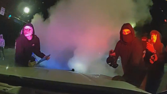 Two Police Cruisers Damaged During Street Takeover