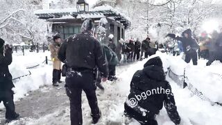 NYPD officers getting hit with snowballs in Washington Square Park this afternoon. This is shameful