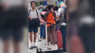 Girl Shocks Airport Naked from the Waist Down Waiting in Line (See Description)