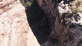 Man Jumps/Falls from Rocky Gorge as Tourists Record