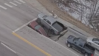 Sinkhole swallows two vehicles in Omaha