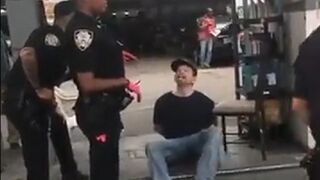 This guy trying to offend the Police Officer by Repeatedly calling her the "N" word