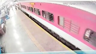 Female Train worker in Green saves the Life of Man trying to get on