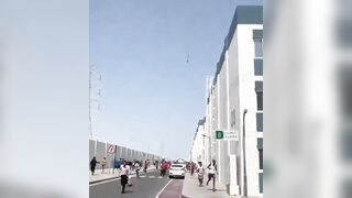 In Qatar, debris from a downed missile fell directly onto people who were running away from it.