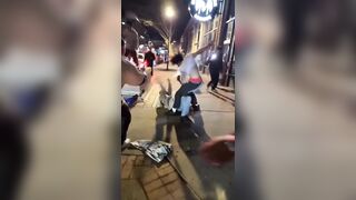 Multiple people were seen brawling outside a parking garage in Salt Lake City