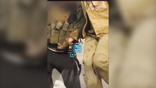 Israeli Soldier tries to Plant GPS or Pull Hamas Grenade?, See Description