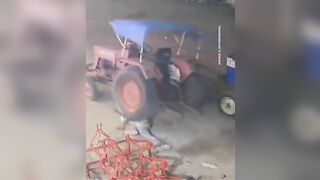 Unbelievable Video shows Man get Run Over by his Own Tractor..then