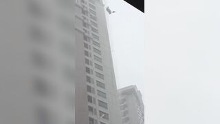 Sad Video shows Glass Cleaner stuck outside in a Storm
