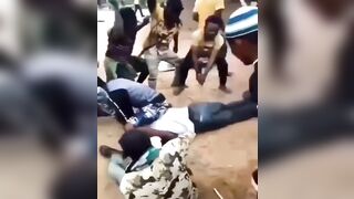 African Lashing Punishment by Entire Town