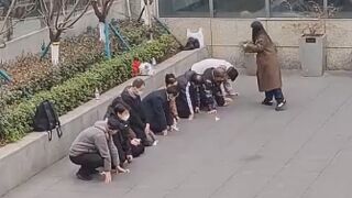 Chinese company employees punished for missing their yearly performance targets