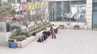 Chinese company employees punished for missing their yearly performance targets