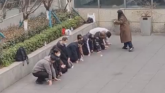 Chinese company employees punished for missing their yearly performance targets