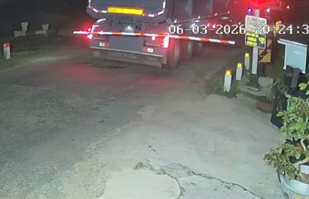 Truck gets Stuck on the Train Tracks and is cut in half