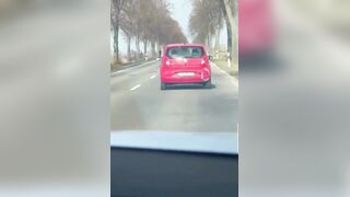 Woman nails Man on the side of the Road sending him flying. How did this happen