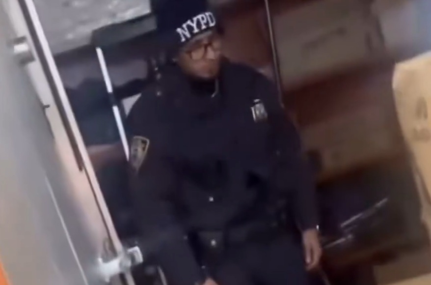 New Yorker store owner loses it after finding a Muslim police officer praying on a mat, blocking the way to the bathroom.