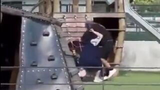 Crazy Muslim man waves a Knife in a Children's Playground