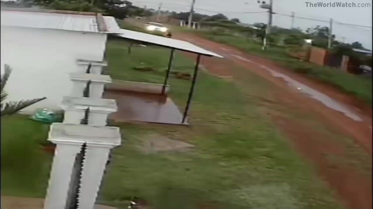 CCTV footage captured the moment a man ran over his wife with a car as she was fleeing from him.