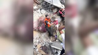 New SHOCK Video shows Bodies being Pulled from Rubble (Warning)