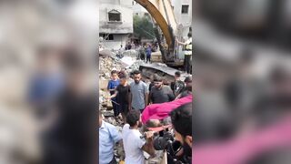 New SHOCK Video shows Bodies being Pulled from Rubble (Warning)