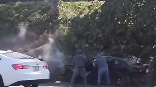 DAMN: Heartless Thieves Robbing a Victim of Car Accident on a Highway!