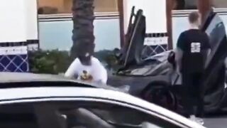 Dude sits on a Man’s Supercar and Finds Out