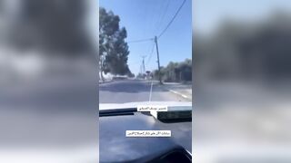 Israeli Tank Obliterates a Car with Palestinian Civilians Recorded on Cell Phone (trying to turn around)