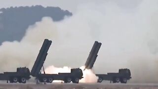 Kim Jong Un and his daughter watch rockets obliterate an island