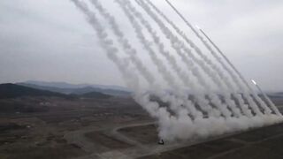 Kim Jong Un and his daughter watch rockets obliterate an island