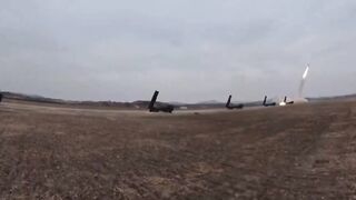 Kim Jong Un and his daughter watch rockets obliterate an island