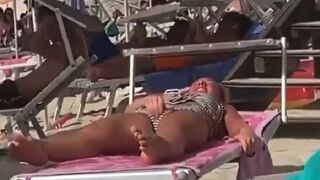 Having a good time Masturbating, , right on the Beach,,,Could Care Less