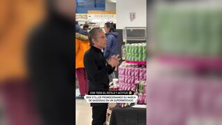 Ben Stiller tries promoting his soda brand in a grocery store while most customers co