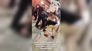 Scumbag Couple tries taking Man's Chain while he is in Handcuffs