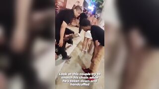 Scumbag Couple tries taking Man's Chain while he is in Handcuffs