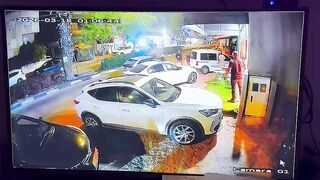 "Surveillance camera footage shows the moment a cluster bomb fell in Kafr Qasim."