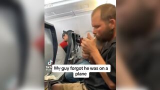 Poor Guy too Stressed Lights Up a Cigarette...Except he's on an Airplane