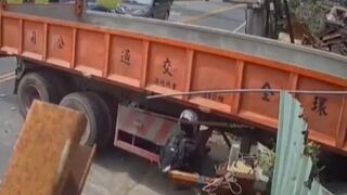 Speeding Motorcyclist becomes One with Truck....Dangles only by his Helmet and Dies there